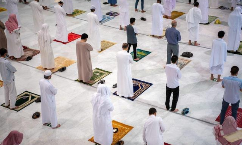 Muslims pray in the Grand Mosque for the first time in months since the coronavirus restrictions were imposed, after they were allowed by the Saudi authorities, in the holy city of Makkah, Saudi Arabia on October 18. &mdash; Reuters