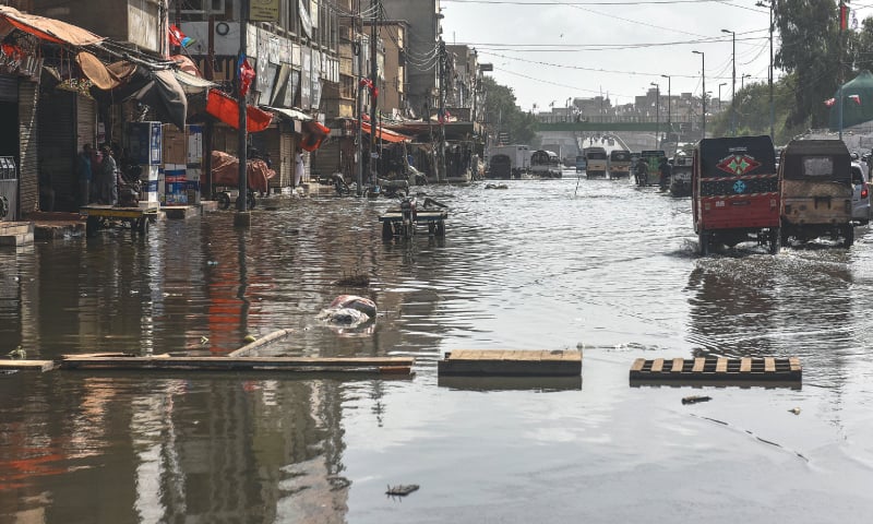 A file photo of recent massive sewage overflow in the Liaquatabad area. — Fahim Siddiqi/White Star