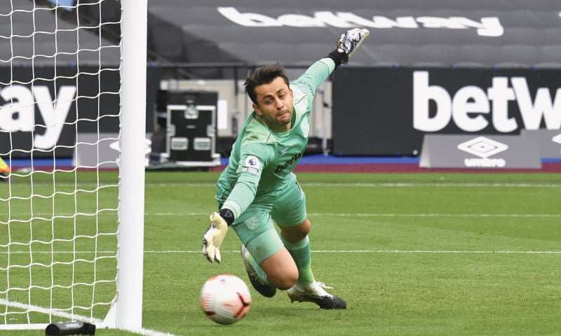 WEST Ham United goalkeeper Lukasz Fabianski fails to save this shot by Phil Foden of Manchester City during their English Premier League match at the London Olympic Stadium on Saturday. — AP