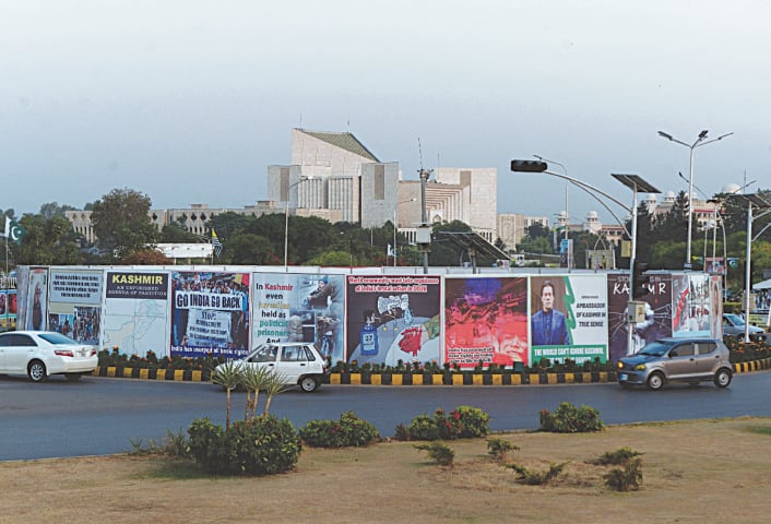 BANNERS installed at Constitution Avenue in Islamabad in connection with black day being observed on Tuesday to express solidarity with Kashmiris in India-held Kashmir.—Mohammad Asim