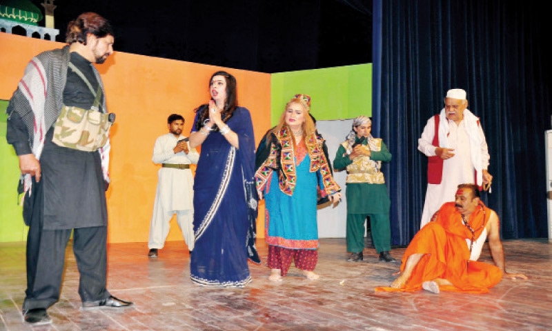 Artists perform in a play Jalti Wadi staged at the Rawalpindi Arts Council to highlight the struggle of Kashmiris in India-held Kashmir. — White Star