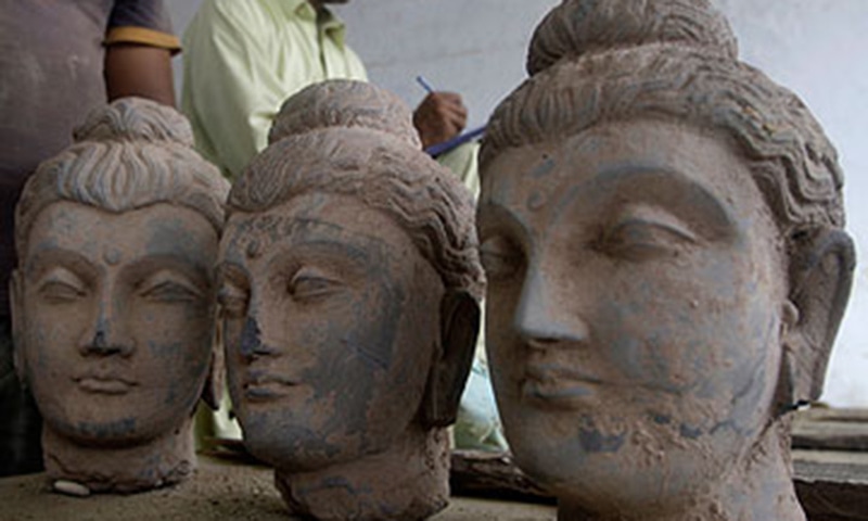 A relic showing Gautama Buddha meditating under the tree of awakening was among the 45 antiquities that the Manhattan District Attor­ney’s office returned to the people of Pakistan this week. — AFP/File