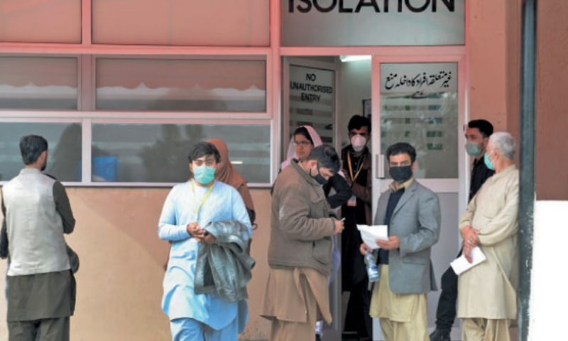 Citizens stand outside the isolation ward of Pims to get themselves checked for coronavirus. &mdash; Photo by Mohammad Asim