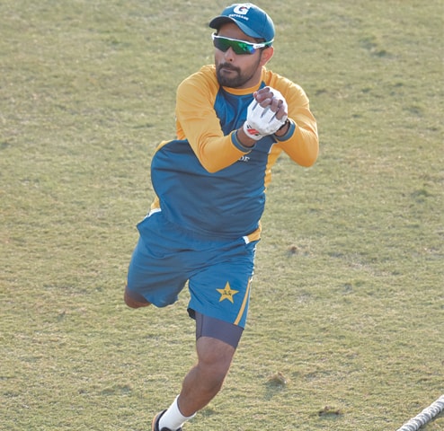 PAKISTAN captain Babar Azam takes a catch during a training session.—White Star