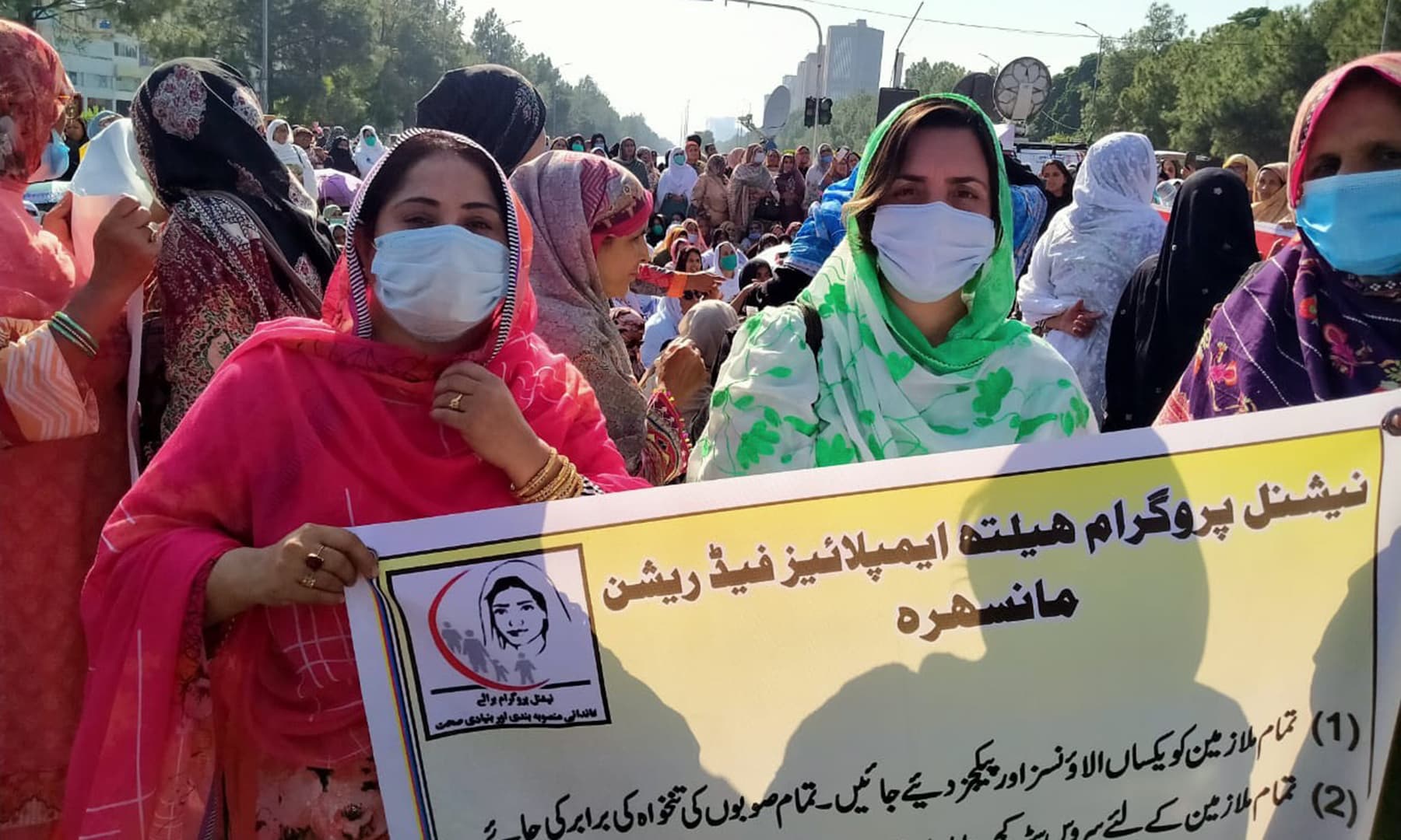 Lady Health Workers from across the country staged a protest sit-in in Islamabad last month seeking their regularisation. — Photo by author