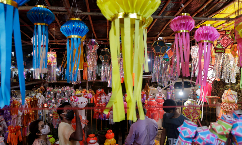 Lanterns are displayed for sale as people shop ahead of Diwali festival in Mumbai, India on November 12, 2020. &mdash; AP
