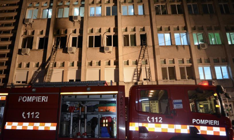 Firefighter ladders on the walls of the hospital in Piatra Neamt, where a fire killed 10 at Covid-19 intensive care unit, in Piatra Neamt, Romania on Nov 14. — Reuters