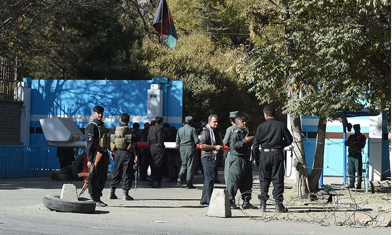 In this file photo, policemen stand guard at an entrance gate of the Kabul University in Kabul on November 2. — AFP/File In this file photo, policemen stand guard at an entrance gate of the Kabul University in Kabul on November 2. — AFP/File