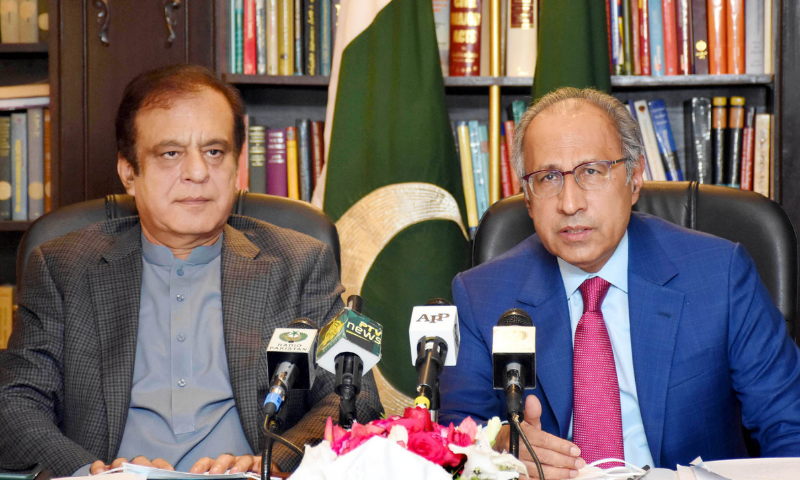 Information Minister Shibli Faraz and Adviser to the Prime Minister on Finance and Revenue Dr Abdul Hafeez Shaikh address a joint press conference in Islamabad on Tuesday. — PID