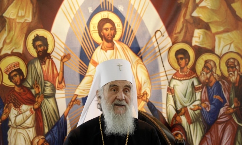 In this 2012 file photo, Serbian Orthodox Church Patriarch Irinej reads his Easter message in Belgrade. — AP