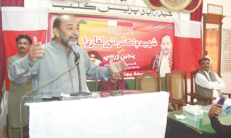 SYED Jalal Mehmood Shah speaks at the programme at the Hyderabad Press Club on Friday.&mdash;Dawn