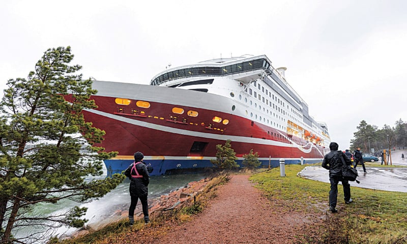 People gather after Viking Line cruise ferry Viking Grace ran aground with some 300 passengers in south of Mariehamn, autonomous Aland Islands territory, Finland. &mdash; Reuters