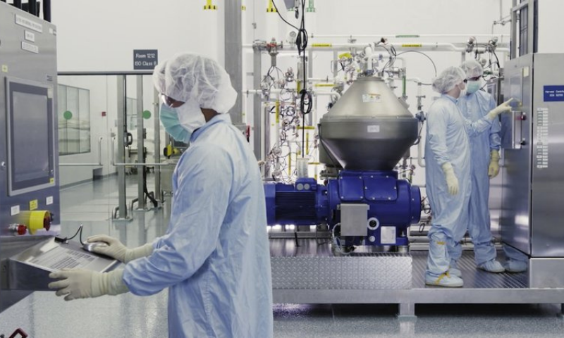 In this undated image from video provided by Regeneron Pharmaceuticals, scientists work with a bioreactor at a company facility in New York state, for efforts on an experimental coronavirus antibody drug. &mdash; AP