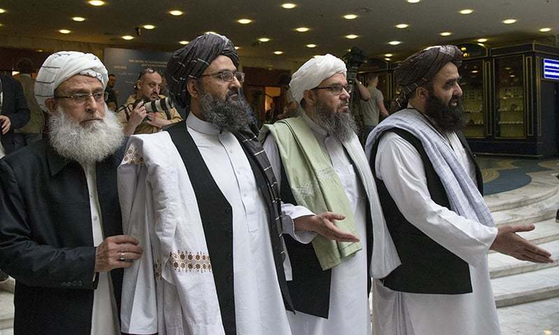 In this May 28, 2019 photo, Mullah Abdul Ghani Baradar, the Taliban group's top political leader, second left, arrives with other members of the Taliban delegation for talks in Moscow, Russia. — AP