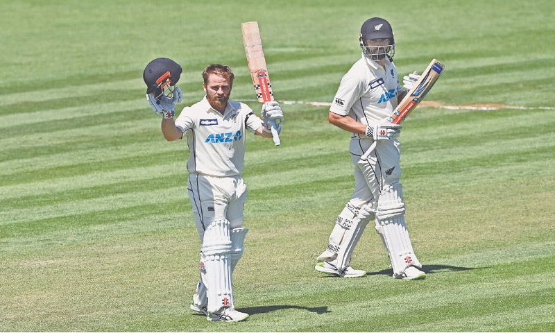 HAMILTON: New Zealand captain Kane Williamson (L) celebrates after completing his double century on day two of the first Test against West Indies at Seddon Park on Friday.—AP