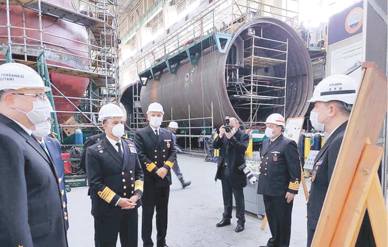 Chief of the Naval Staff Admiral Mohammad Amjad Khan Niazi being briefed on Golcuk Naval Shipyard in Turkey.&mdash;APP