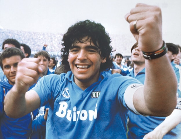 Maradona celebrates after Napoli clinches its first Italian major league title on May 10, 1987 | AP