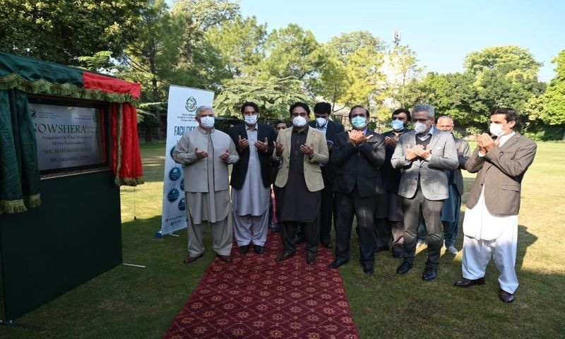 Khyber Pakhtunkhwa Chief Minister Mahmood Khan on Wednesday performed the groundbreaking of the Nowshera Economic Zone Extension Project and distributed letters of plot allotment among investors during a special ceremony. &mdash; Photo courtesy PTI KP Twitter