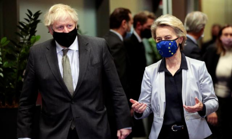 European Commission President Ursula von der Leyen welcomes British Prime Minister Boris Johnson in Brussels, Belgium on Dec 9. — Reuters/File