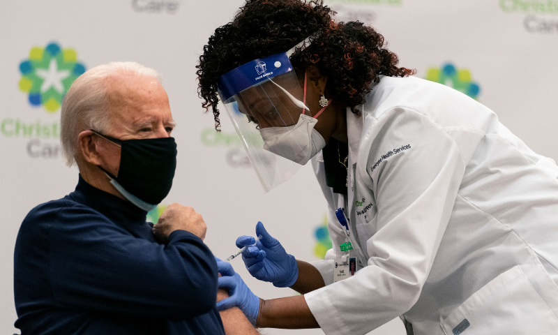 US President-elect Joe Biden receives his first dose of the coronavirus vaccine from nurse Tabe Mase at Christiana Hospital in Newark, US on Monday. — AP