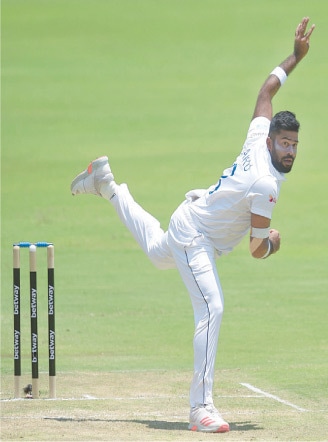 SRI LANKAN paceman Lahiru Kumara bowls during the first Test against South Africa at SuperSport Park on Sunday.—AFP