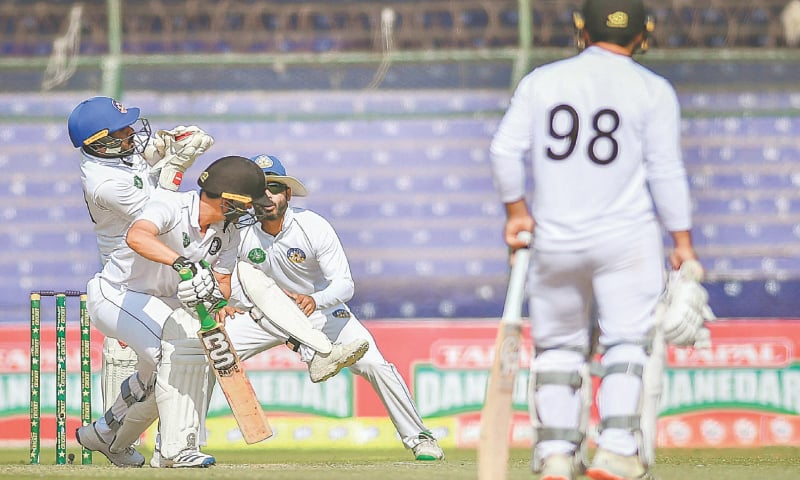 KARACHI: Central Punjab wicket-keeper Ali Shan takes a fine catch to dismiss Khyber Pakhtunkhwa opener Israrullah during the Quaid-e-Azam Trophy final at the National Stadium on Friday.—Courtesy PCB KARACHI: Central Punjab wicket-keeper Ali Shan takes a fine catch to dismiss Khyber Pakhtunkhwa opener Israrullah during the Quaid-e-Azam Trophy final at the National Stadium on Friday.—Courtesy PCB