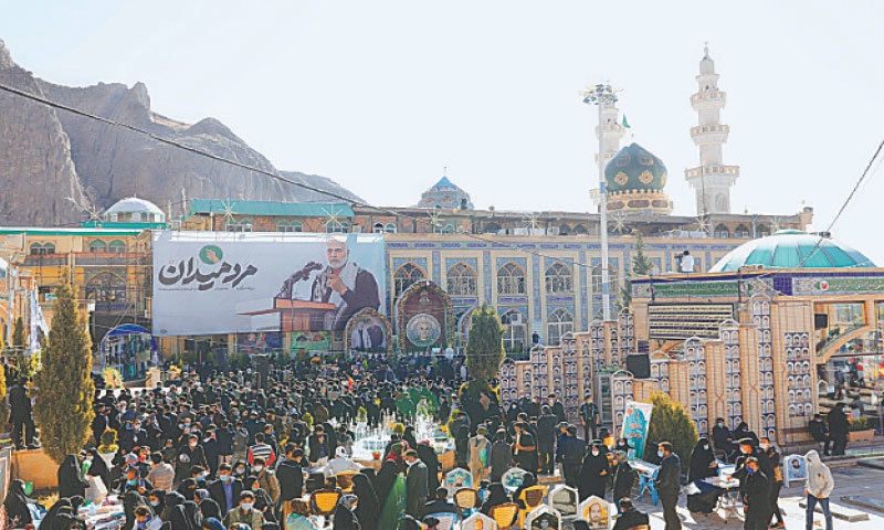 People visit the grave of senior Iranian military commander General Qassem Soleimani during the one year anniversary of his killing in a US attack at his hometown of Kerman on Saturday. —Reuters