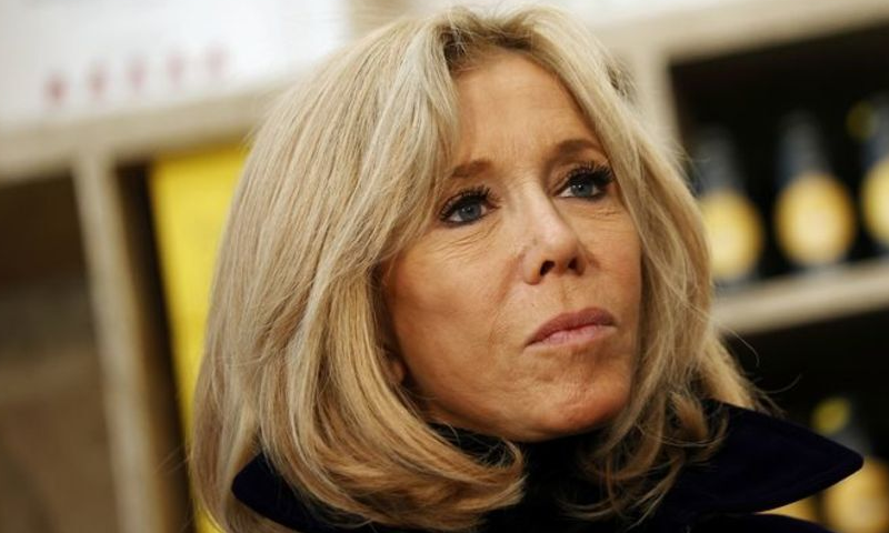 French First Lady Brigitte Macron visits the new Cafe Joyeux coffee shop, which employs people with Down's syndrome and other cognitive disabilities, in Paris, France. — Reuters/File