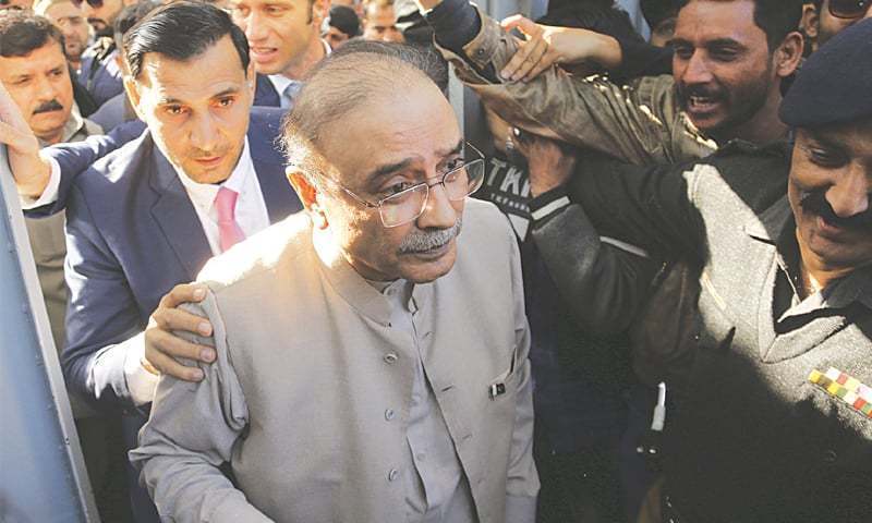 In this file photo, former president Asif Ali Zardari arrives in a court for a hearing. — AP/File