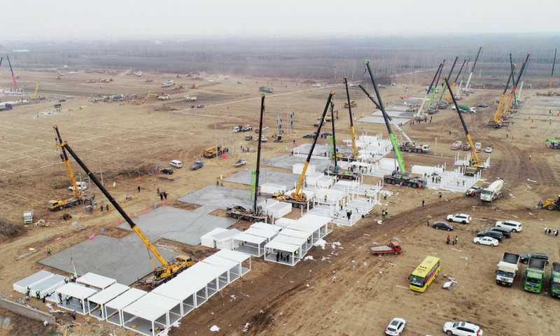 In this aerial photo, workers build a large centralised quarantine facility in Shijiazhuang in northern China's Hebei Province on Jan 14. &mdash; AP