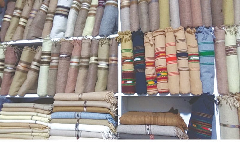 Khaddar shawls displayed in a variety of shades and hues at the centuries-old Rajjar market in Charsadda