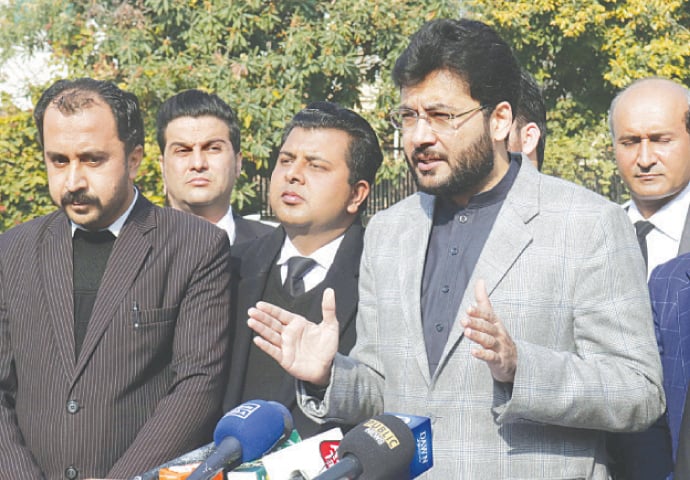 ISLAMABAD: PTI leader Farrukh Habib speaks to reporters outside the Election Commission of Pakistan on Monday.—White Star