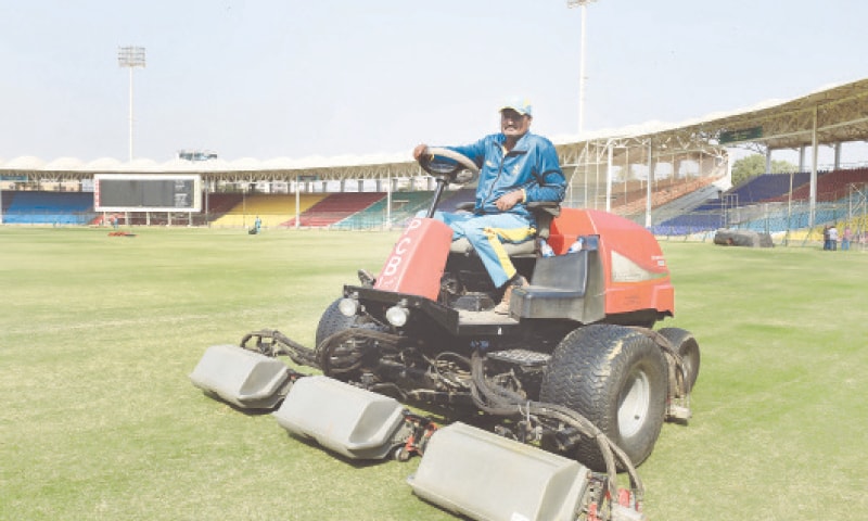 KARACHI: A groundstaff member busy in trimming grass of the National Stadium outfield on Tuesday in preparations for next week’s first Test between Pakistan and South Africa.
—Tahir Jamal/White Star KARACHI: A groundstaff member busy in trimming grass of the National Stadium outfield on Tuesday in preparations for next week’s first Test between Pakistan and South Africa.
—Tahir Jamal/White Star