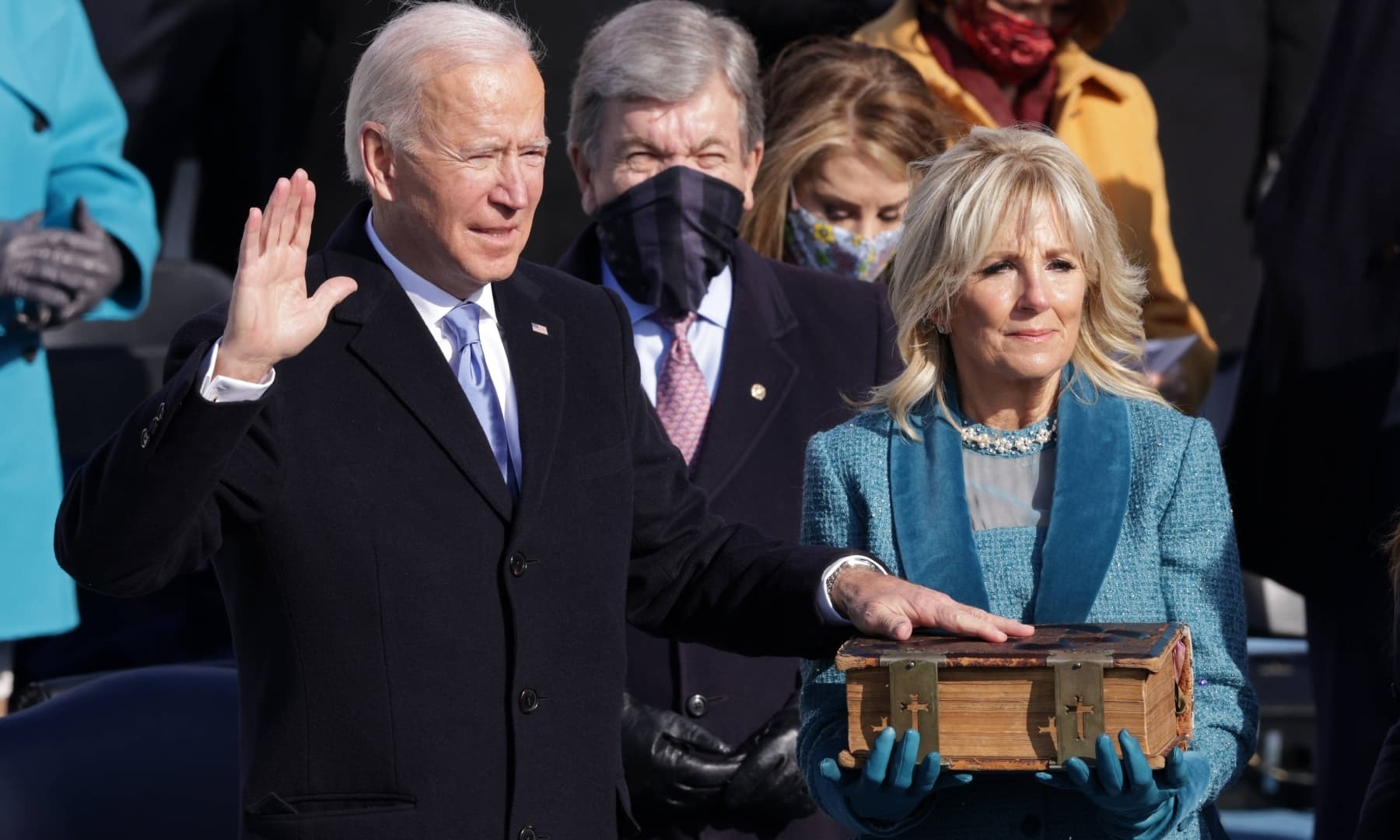 Joe Biden is sworn in as US President as his wife Dr Jill Biden looks on during his inauguration on the West Front of the US Capitol on January 20 in Washington, DC. — AFP