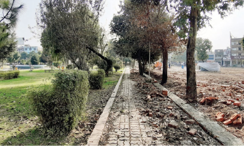 Work underway on a parking lot in Commercial Market in Rawalpindi. &mdash; White Star