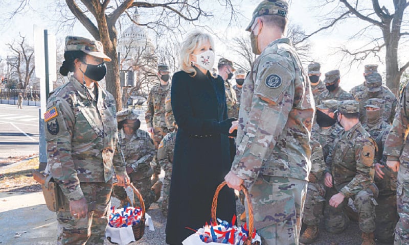 First lady Jill Biden greets members of the National Guard with chocolate chip cookies outside the Capitol in Washington.&mdash;AFP