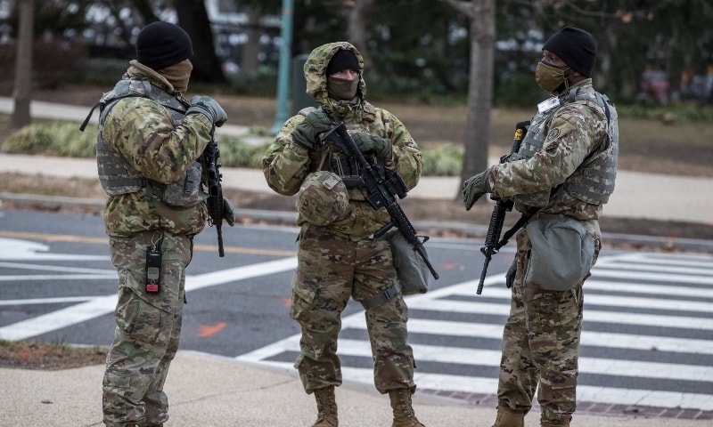 National Guard stand watch at the US Capitol on January 28 in Washington. — AFP National Guard stand watch at the US Capitol on January 28 in Washington. — AFP