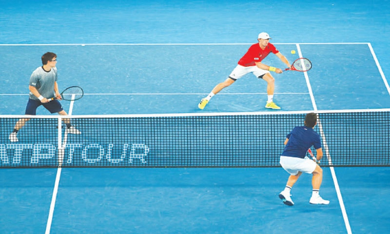 MELBOURNE: Japan’s Ben McLachlan and Toshihide Matsui in action during their group stage match against Maximo Gonzalez and Horacio Zeballos of Argentina in ATP Cup at the Melbourne Park on Saturday.—Reuters MELBOURNE: Japan’s Ben McLachlan and Toshihide Matsui in action during their group stage match against Maximo Gonzalez and Horacio Zeballos of Argentina in ATP Cup at the Melbourne Park on Saturday.—Reuters
