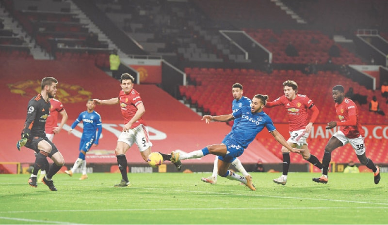MANCHESTER: Everton’s Dominic Calvert-Lewin shoots to score during the Premier League match against Manchester United at Old Trafford.—Reuters