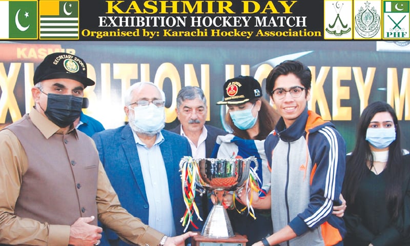 KARACHI: Captain of Youth Hockey Club receives winner’s trophy from Vice Chancellor NED University Professor Dr Sarosh Lodhi. KARACHI: Captain of Youth Hockey Club receives winner’s trophy from Vice Chancellor NED University Professor Dr Sarosh Lodhi.