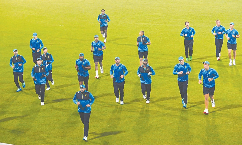 MEMBERS of South Africa’s Twenty20 squad jog during a training session at the Gaddafi Stadium on Tuesday.
—M.Arif/White star MEMBERS of South Africa’s Twenty20 squad jog during a training session at the Gaddafi Stadium on Tuesday.
—M.Arif/White star