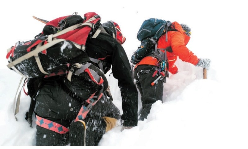 This photo shows Ali Sadpara and Alex Txikon climb Nanga Parbat in 2019 in search of two missing mountaineers. — Dawn/File