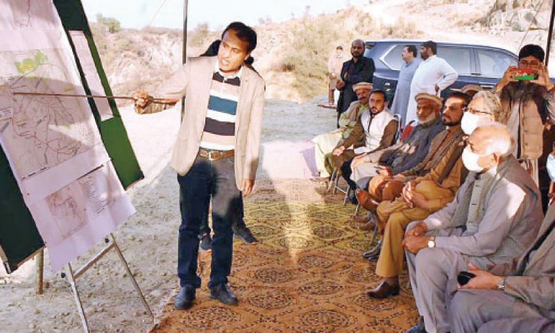 Aviation Minister Ghulam Sarwar Khan being briefed about the Ring Road and Chaham Dam projects in Chakri on Saturday. — APP Aviation Minister Ghulam Sarwar Khan being briefed about the Ring Road and Chaham Dam projects in Chakri on Saturday. — APP