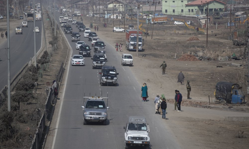 A motorcade of diplomats from various countries moves through in Srinagar, occupied Kashmir on Wednesday. — AP