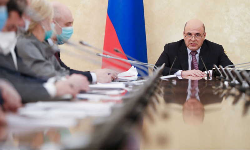 Russian Prime Minister Mikhail Mishustin chairs a meeting of the bureau of the governmental board on vaccines against Covid-19, in Moscow on February 20, 2021. — AFP