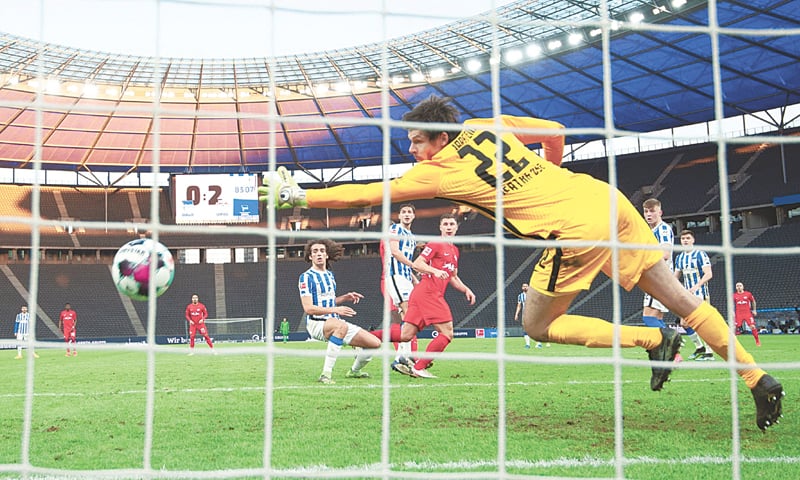 BERLIN: RB Leipzig&rsquo;s Willi Orban scores (C) scores during the Bundesliga match against Hertha Berlin at the Olympiastadion.&mdash;Reuters