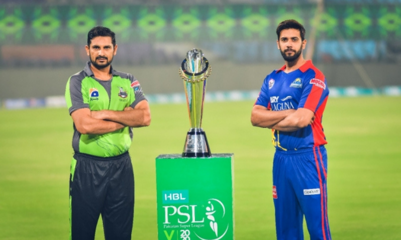 In this file photo, rival skippers Sohail Akhtar of Lahore Qalandars (L) and his Karachi Kings counterpart Imad Wasim pose with the Pakistan Super League trophy on eve of last year's PSL final. — Courtesy PCB