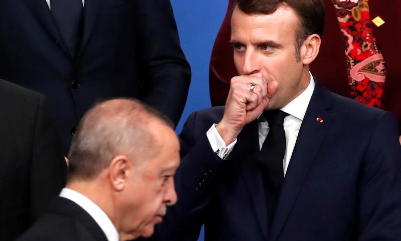 France's President Emmanuel Macron gestures next to Turkey's President Recep Tayyip Erdogan during a photo opportunity at the Nato leaders summit in Watford, Britain, December 4, 2019. — Reuters/File