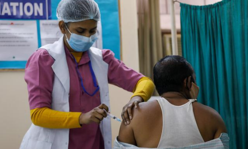 A man receives Bharat Biotech's Covid-19 vaccine called Covaxin, at a vaccination centre, in New Delhi, India. — Reuters