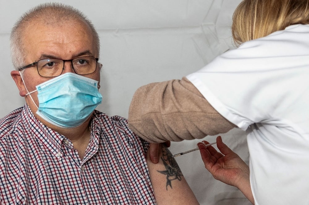 A man receives a dose of Moderna Covid-19 vaccine in Saint-Pierre, in the French northern Atlantic archipelago of Saint-Pierre-et-Miquelon, on March 20. — AFP